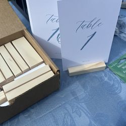Sign Stands With Blue And White Table Numbers