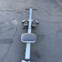 IN MOTION ROWER MACHINE. COMPACT FOR EASY MOVING AND EASY STORAGE. $60.00  OR BEST OFFER.