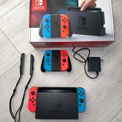 Nintendo Switch With Extra Set Of Joy Con Controllers