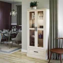 Truman Curio Cabinet with Drawer, White Oak  STYLISH SHOWCASE: Two wood-framed glass doors and three 6mm thick glass shelves to display dec