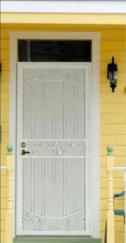 36 in. x 80 in La Entrada Navajo White Surface Mount Outswing Steel Security Door with Perforated Metal Screen