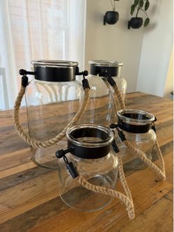 Four Decorative Containers