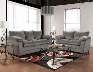 Two piece grey couch and love seat furniture