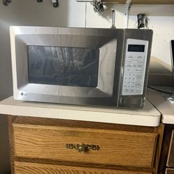 LG Microwave with 1200 Cooking Watts & 3 Auto Defrost Options