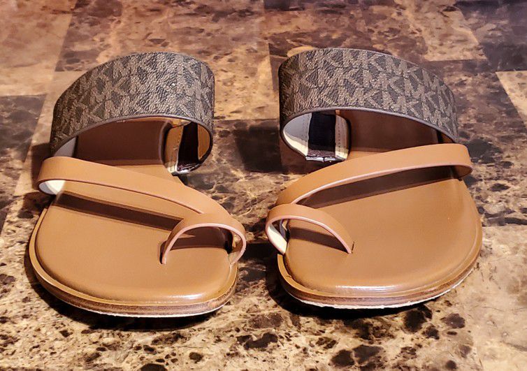 Michael Kors Nelson Flat Sandal Mini MK Logo, - Slip-on styling, - Color: Brown, - Size: 8M
