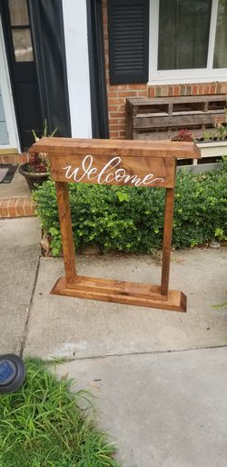 Welcome sign with flower pot hanger