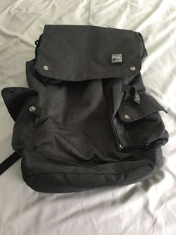Mr. Ylls Laptop Backpack with charging port connector.