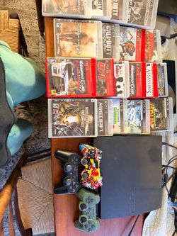 PS3 Slim Console Bundle with 2 Controllers and Games