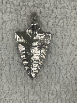 vintage Silvertown arrowhead pendant.