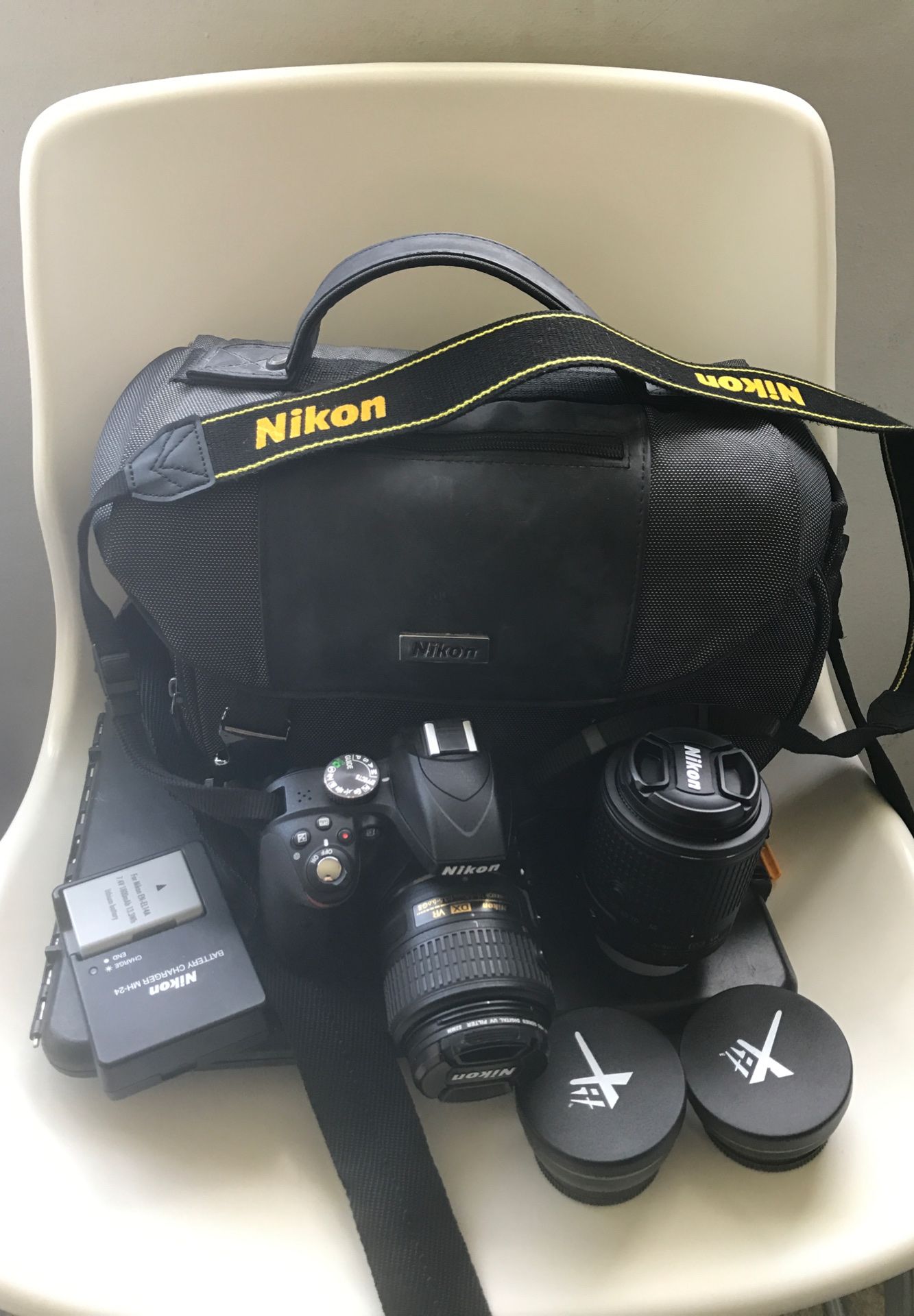 Nikon DD3300. With 4 lenses and charger,two battery, and original carry bag. Asking price $500.00.