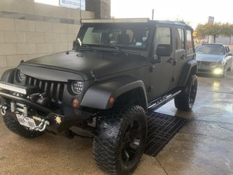 2007. Jeep Wrangler unlimited. Trade for a 4 cl car or truck and cash.