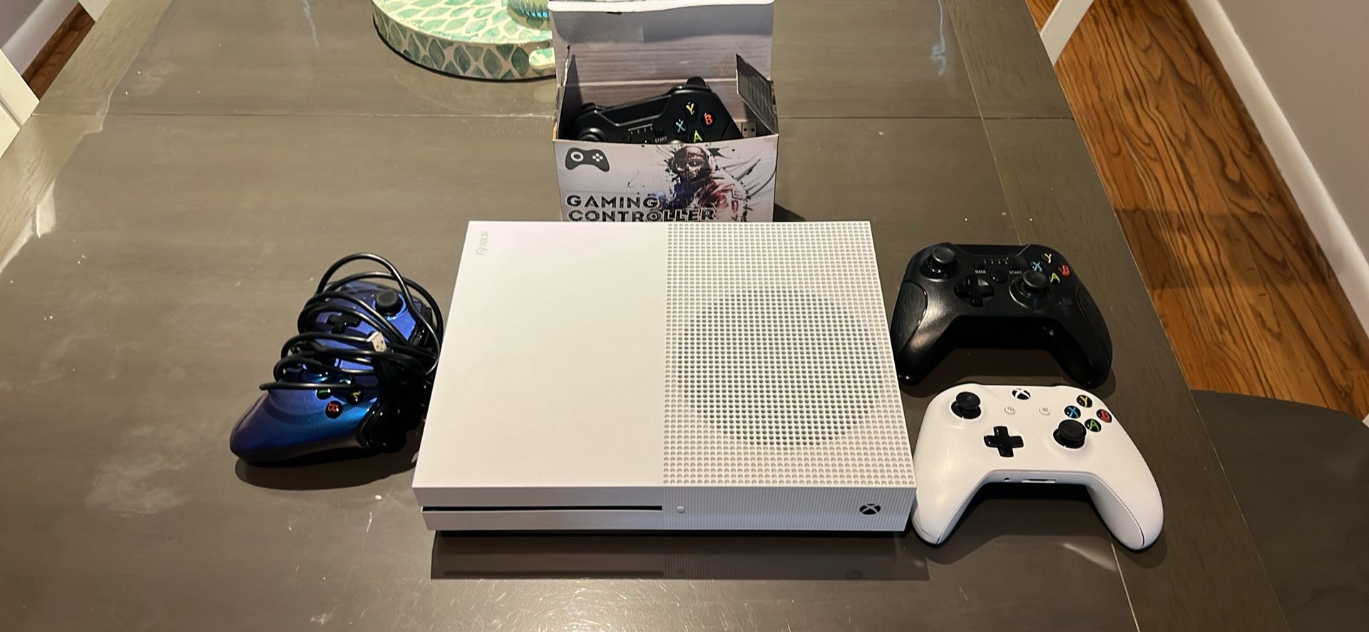 Xbox One s In Great Working Condition And (4) Various Controllers In Varying Condition