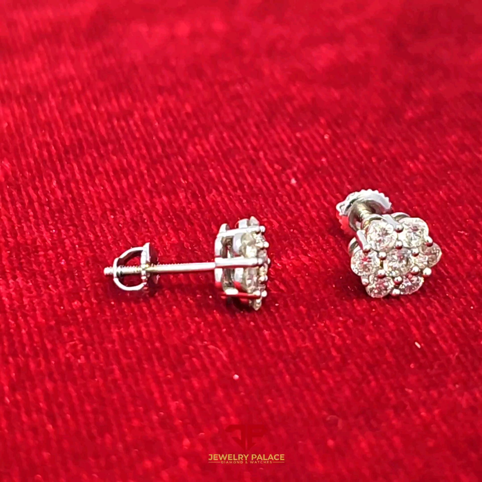 Fancy flower earring with 10K White Gold and 0.875 CTW diamonds