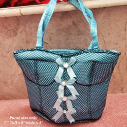 Makeup bag  Girls teenager  Bustiere Purse pocketbook
7 " Tall x 9 "wide x 4" depth .
make up bag (Measures with handle straps  with handles 14" tall 