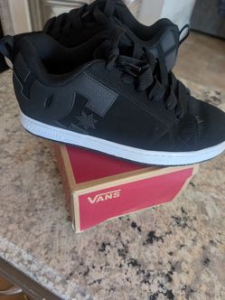 Black DC skater shoes