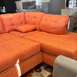 Orange Sectional With Ottoman