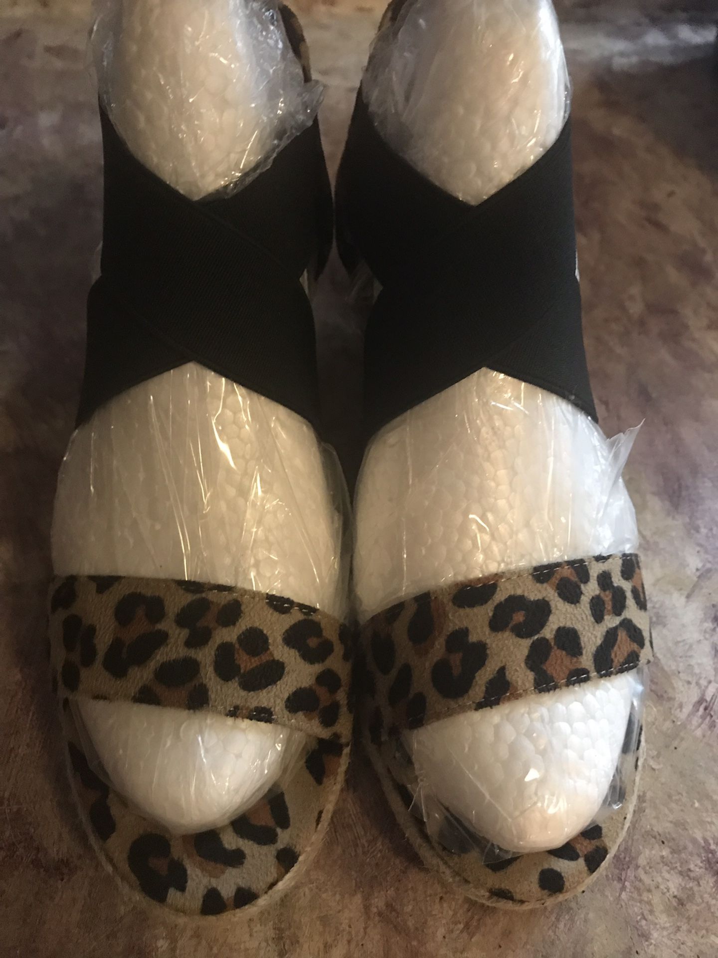 Cute Leopard print one round tie wedge sandals. Size 5