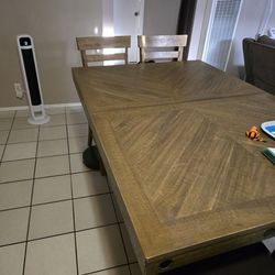 Bob's Furniture sonoma counter height expandable table with 4 chairs and bench