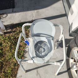 Three in one commode brand new with bucket