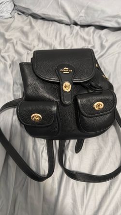 Small coach backpack firm on price
