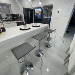 Modern design adjustable bar stools/ barstools in box only  $50 each. 