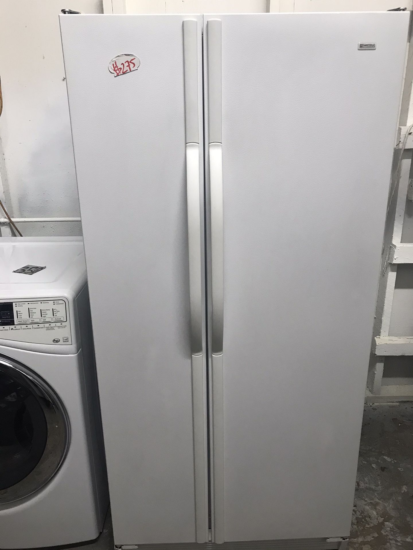 Kenmore white refrigerator 31” Wide 67” Tall in excellent condition plus 6 months warranty. Delivery service available
