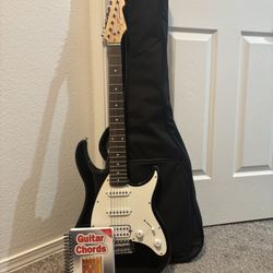 Peavey Electric Guitar, Soft Case, and Guitar Chord Book 