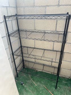 Metal shelf 35” wide by 53” tall & 14” width