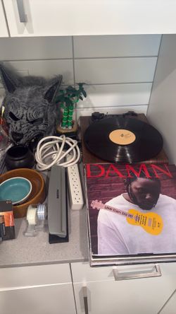 Book shelf/ board games / record player / arts and crafts / paint box / ottoman