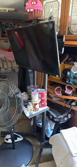 ROKU TV and TV stand
