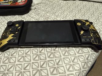 Nintendo Switch w/ Pikachu grips