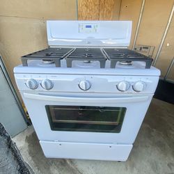 Whirlpool gas stove 4 burners white color  30”