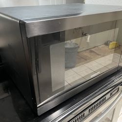 17inches wide 23 inches long 12.5 inches Tall counter Top Samsung Microwave 
