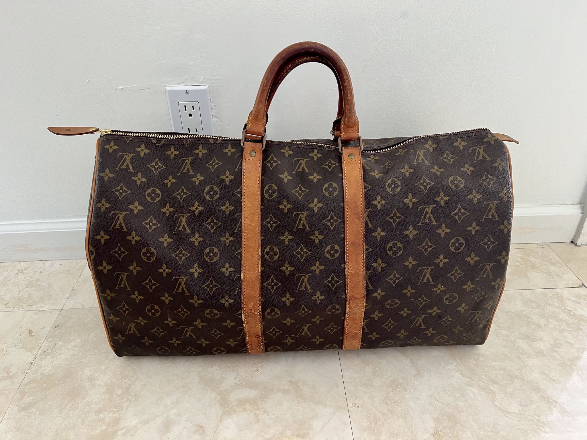 Louis Vuitton Keepall 55 second hand prices