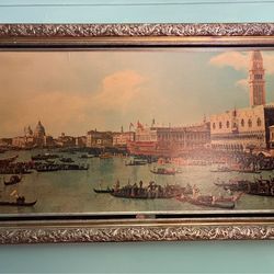Painting depicting Venice, Italy, with gilt frame, 31 x 56 inches.