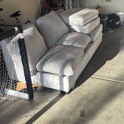 Grey Couch With All The Cushions