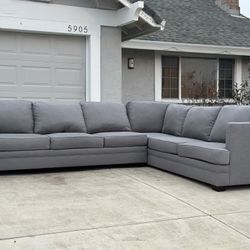 Free Delivery/Sectional Sofa by Living Spaces 