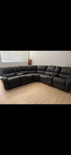 Black leather sectional couch