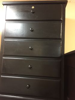 Black dresser with lock
