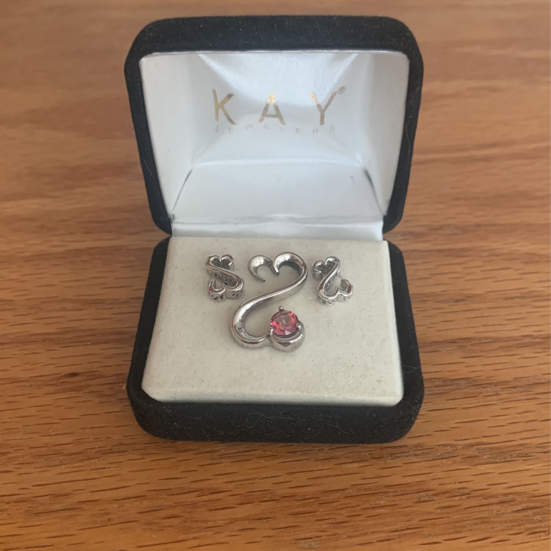 Silver Infinity Pendant And Earrings