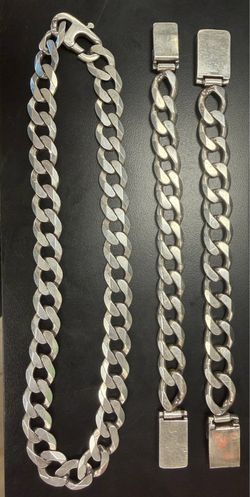 Heavy silver necklace and bracket set