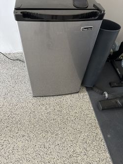 Magic Chief small refrigerator, stainless steel, and black, gray, and black