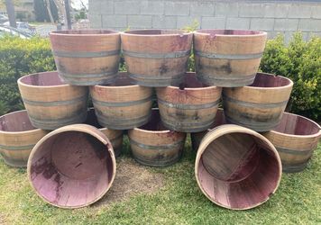 Wine barrel planters $30