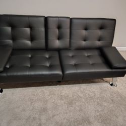 Brand New Black leather sofa