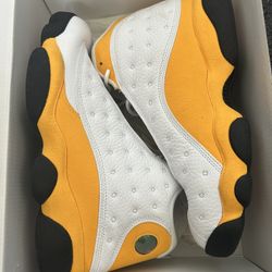 Yellow white Jordan 13s