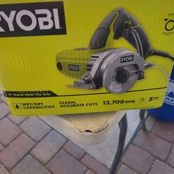 RYOBI 4" HAND HELD TILE SAW  ELECTRIC 