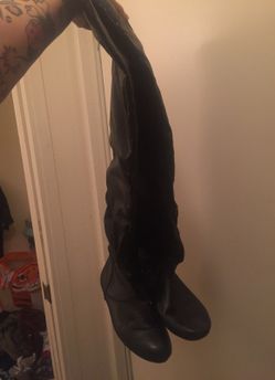 Thigh high black boots