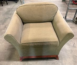Beige upholstered chair