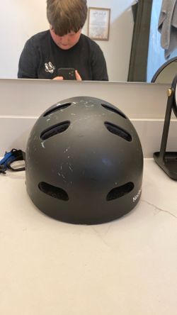 Black and blue bike helmet