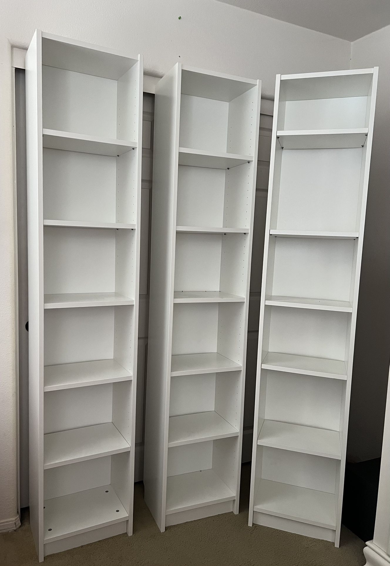 3 White Book Shelves